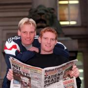 Great Danes Per Frandsen, left, and Michael Johansen check out the Bolton Evening News