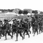 Soldiers marching off to the front.