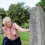 Margaret Gillard at the restored Blackledge family grave in Tonge cemetery