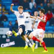 Joe Mason takes on Middlesbrough's Lee Tomlin on Tuesday night