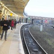 TRAINS: Passengers wait for a train on platform three at Bolton Train Station