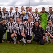 CHAMPIONS: Old Bolts celebrate winning the Lancashire Amateur League 1st XI cup on Saturday