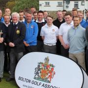 READY: BGA president Glynn Evans with the Sheffield Union of Golf Clubs president and some of the players with the trophy