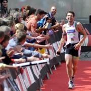 RACE: Thomas Christiaens from Belgium nears the finish line at last year’s Ironman
