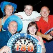 Fans enjoying the darts. Front,from the left, Phil Snape and Carol Gornall. Back: Deborah Birchall, Ben Cooke and Mike Birchall. Photo by Paul Gardne