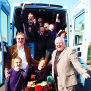 ALL ABOARD: It’s a thumbs up from James Crowther, aged 11, with, from left, Len Keighley, chairman of the Variety Club North West, Danielle Evans, age