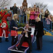 Mayor of Westhoughton, Cllr David Chadwick, centre, opens the new play area with Mayoress, Victoria Chadwick, left, and Cllr Elaine Sherrington, right