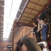 Matthew Johnson, left, and Matthew Durkan on the “McNaughted” Beam Engine at the museum
