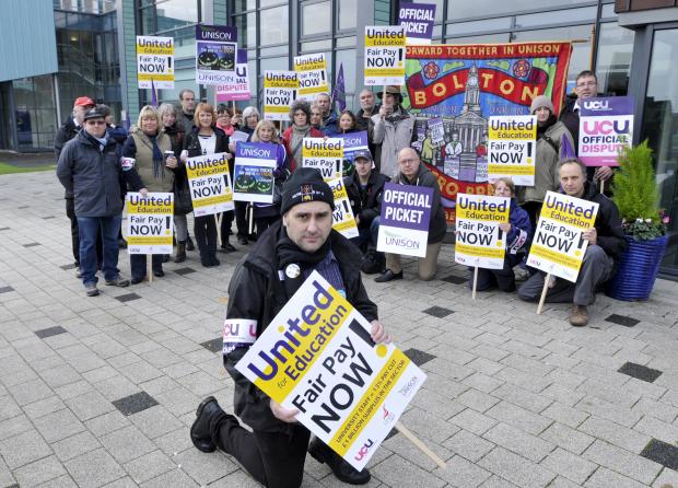 University staff on strike, with union secretary Damien Markey at the front