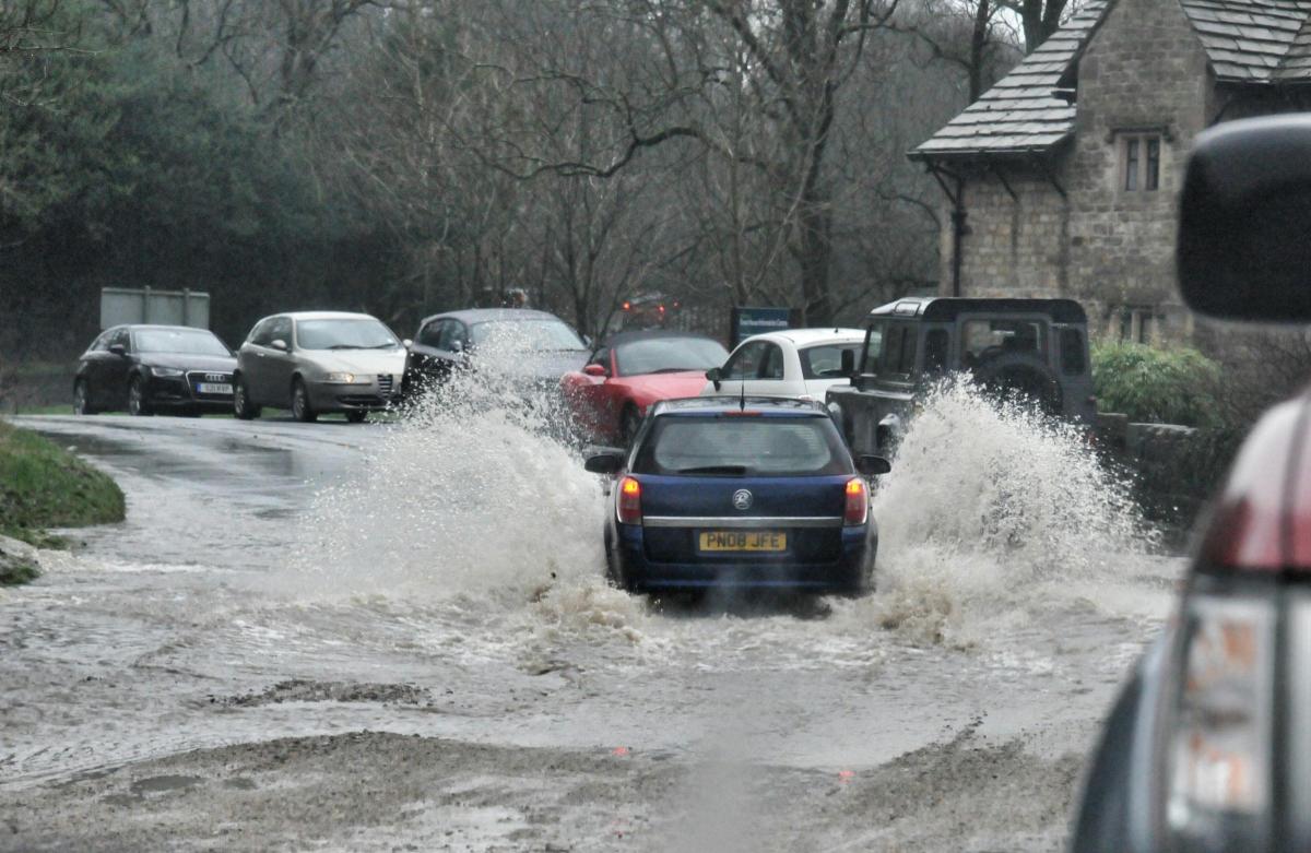 The flooded road in Rivington during torrential rain
