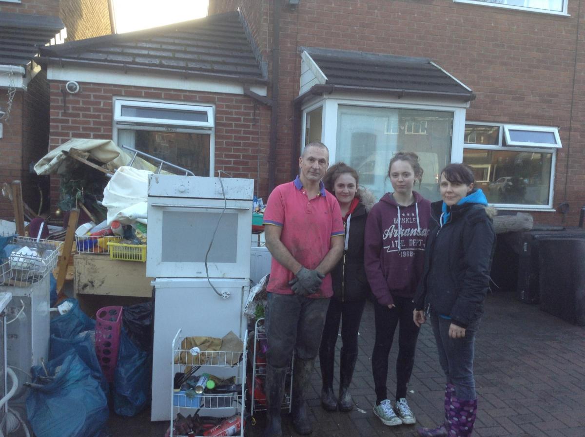 Family affected by the floods in Bolton