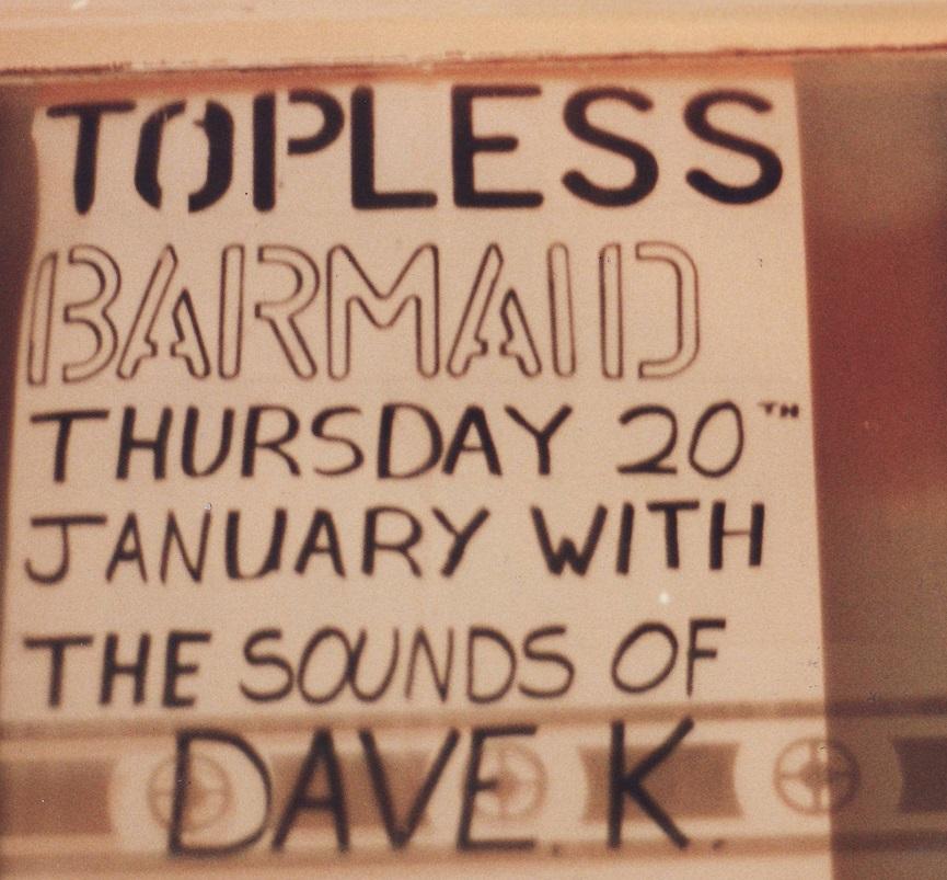 Topless barmaid advertisement at the Victoria, 1994