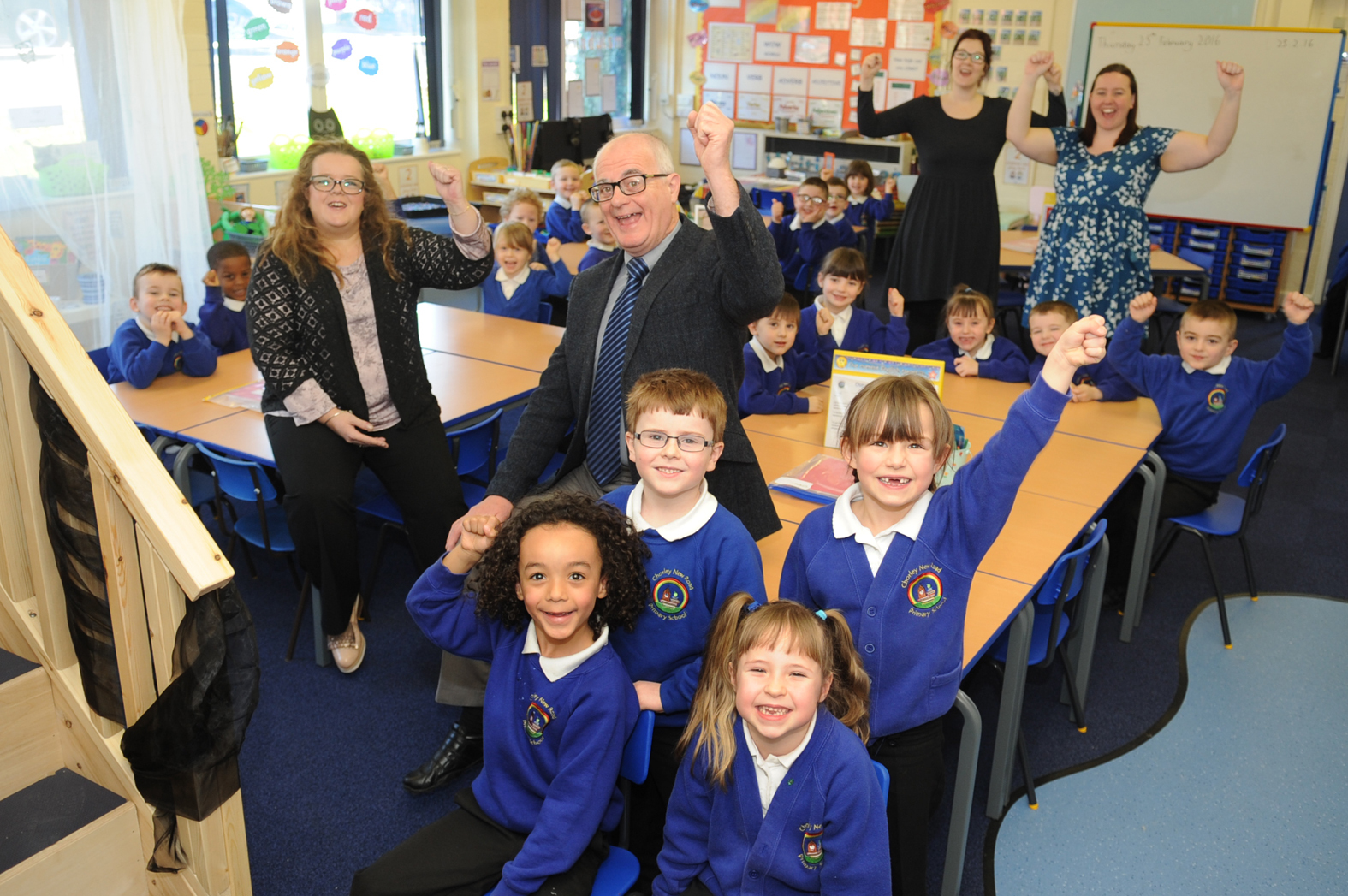 PICTURES: Children move back into classrooms destroyed in the Boxing Day floods