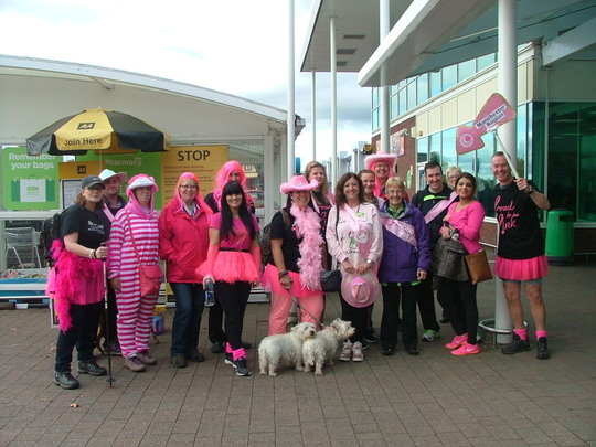 Supermarket staff tickled pink at charity relay walk