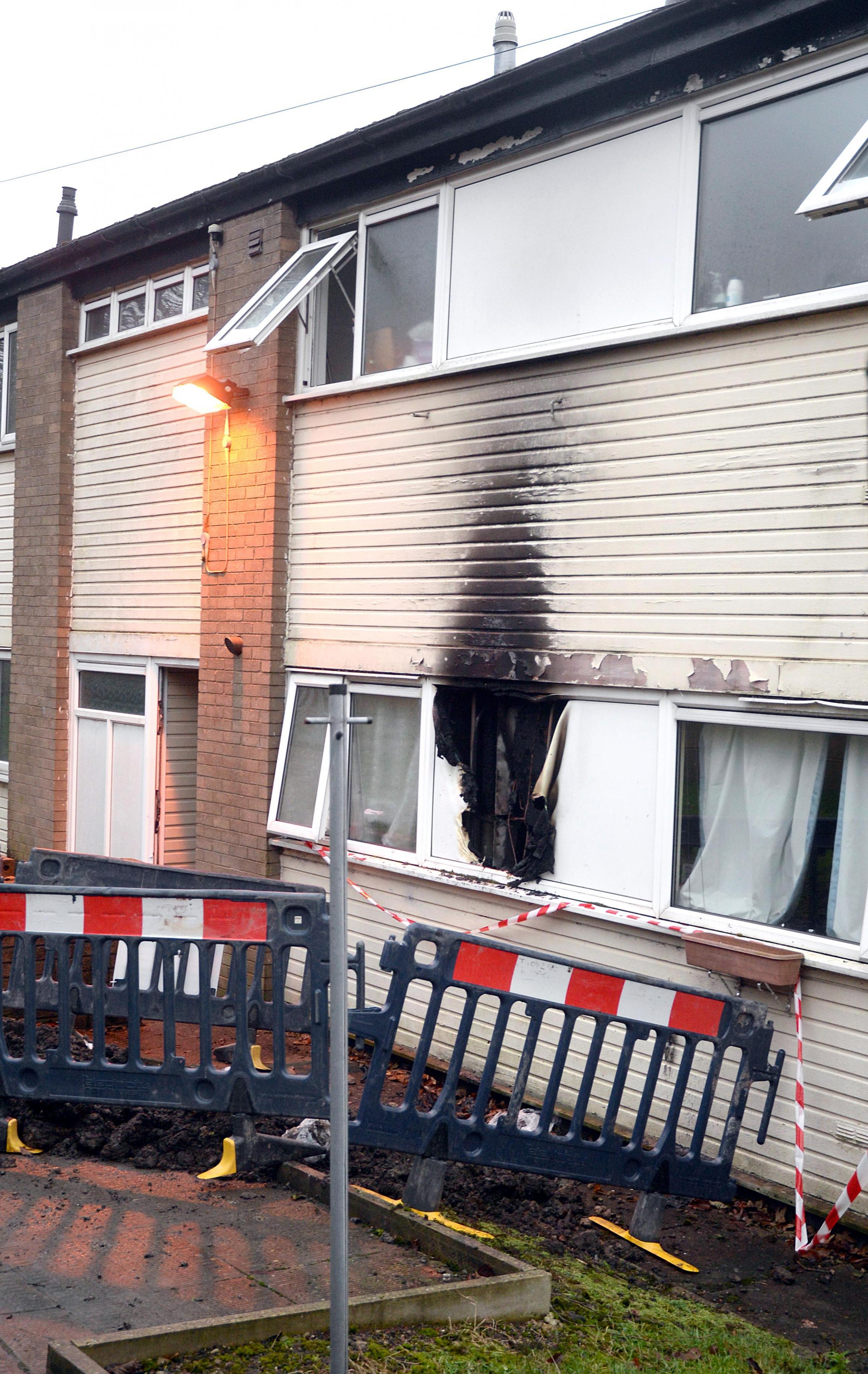 Arson charge for Bolton man after flat fire