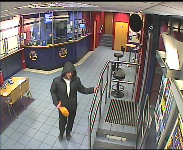 CCTV appeal after man threatens bookmaker staff and steals 'large amount' of money