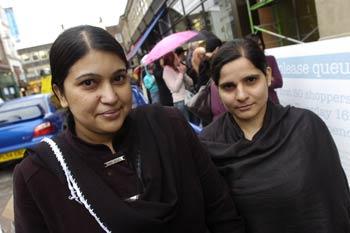 Shazia Hussain and Saiqua Resman of Great Lever, the first two customers in the queues outside the Market Hall