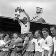 Nat Lofthouse lifts the 1958 FA Cup at Wembley following a win against Manchester United