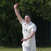 Farnworth’s David Mather celebrates taking the wicket off Padiham’s Joseph Edgar. Picture by Harry McGuire