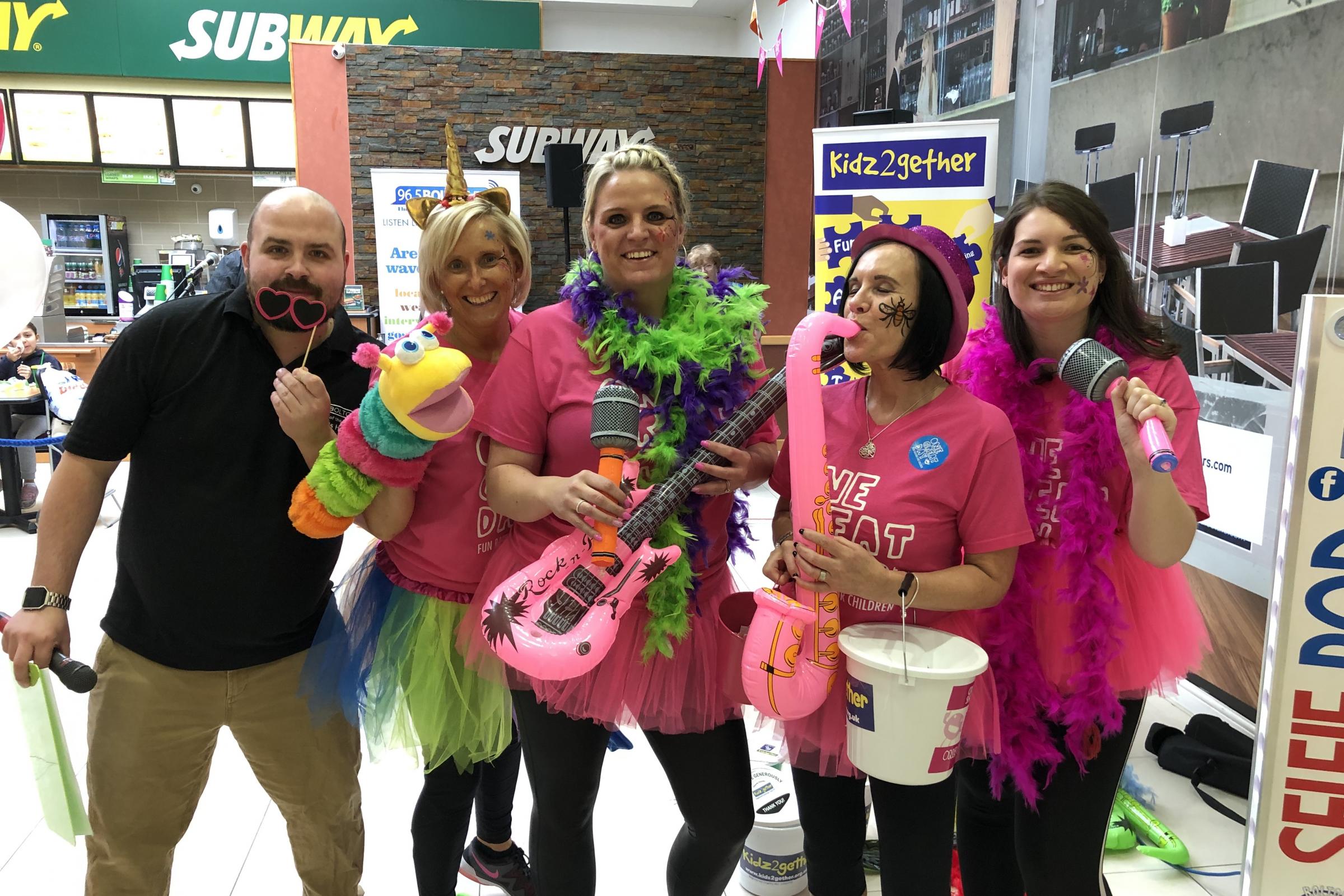 Dancers don feather boas for One Great Day in aid of children's charities