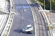 Police hunting driver who fled after smashing into barriers on motorway slip road