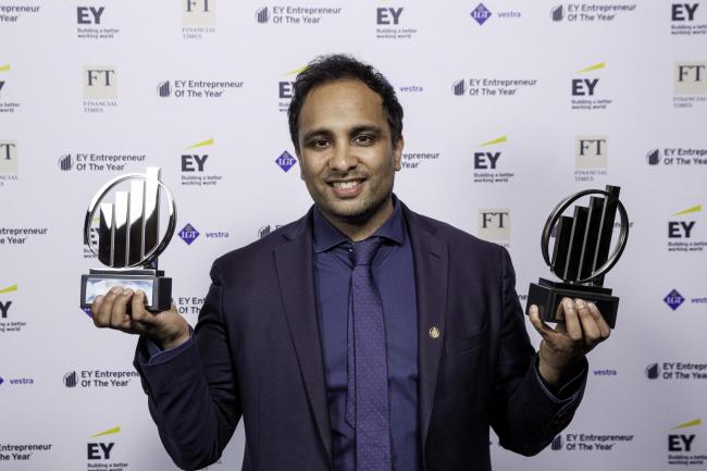 Imran Hakim, CEO of the Hakim Group, with his two entrepreneurial awards