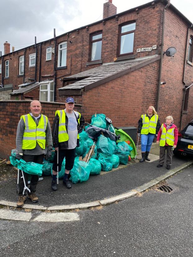 The Bolton News: Litter pickers in Hulton