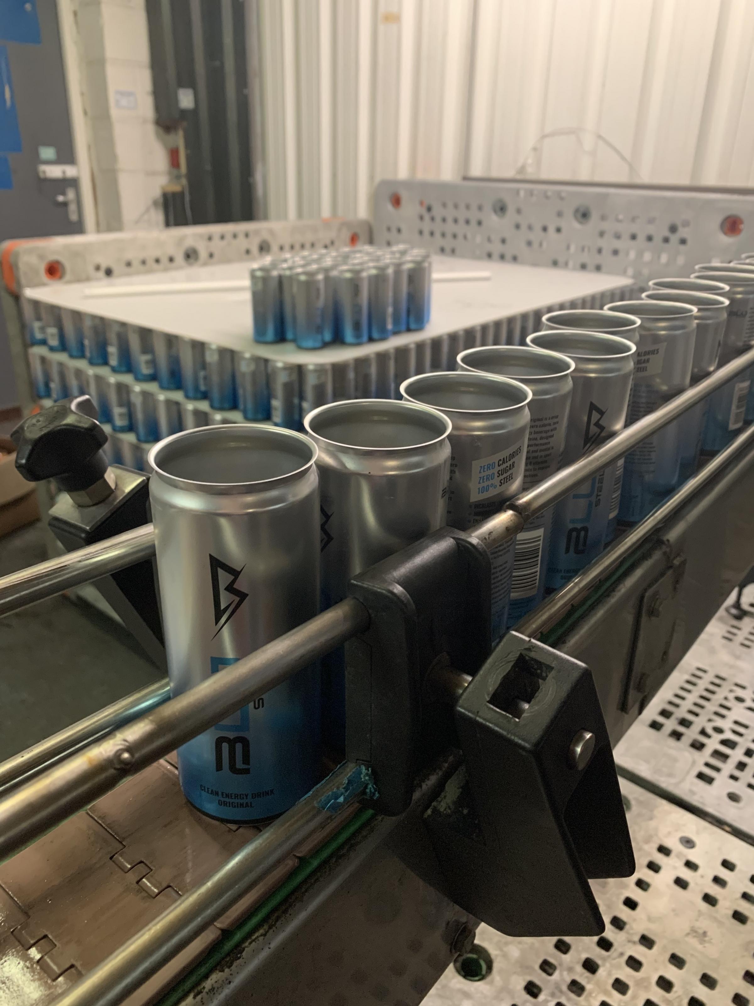 Blu Steel cans on the production line