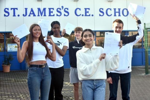 Students at St Jamess CE High School with their GCSEs in the summer of 2020