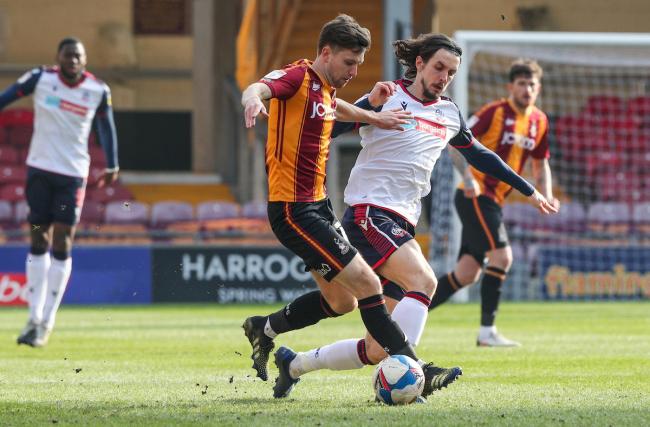 MJ Williams in action for Wanderers against Bradford City