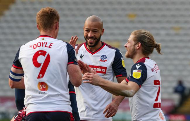 Alex Baptiste, Eoin Doyle and Lloyd Isgrove celebrate a goal at Bradford City.