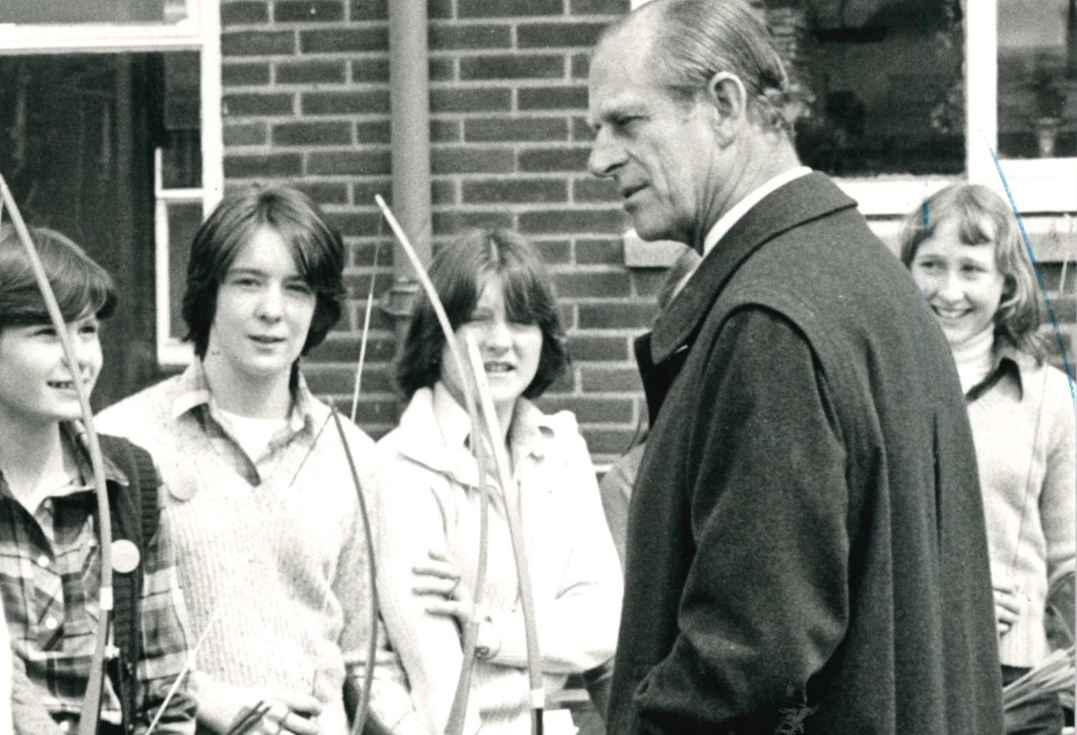 Duke of Edinburgh chats with pupils of the former St Cuthberts RC Secondary School who got to grips with archery as part of thier Duke of Edinburgh bronze award in 1979