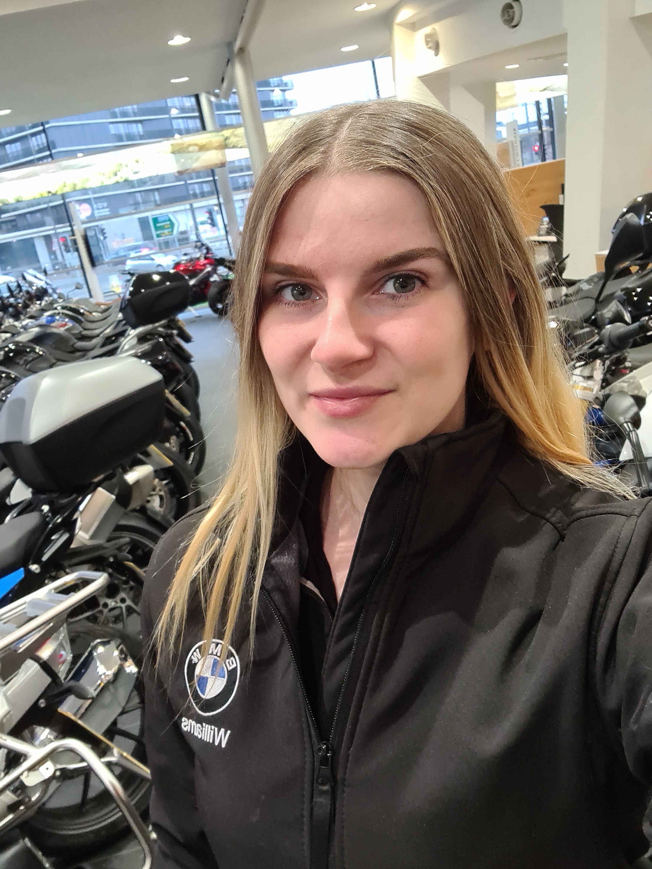 The 29-year-old at her place of work, BMW motorcycle dealership Williams Motorrad in Manchester
