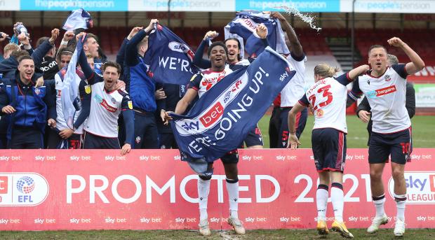 The Bolton News: Wanderers players celebrating promotion