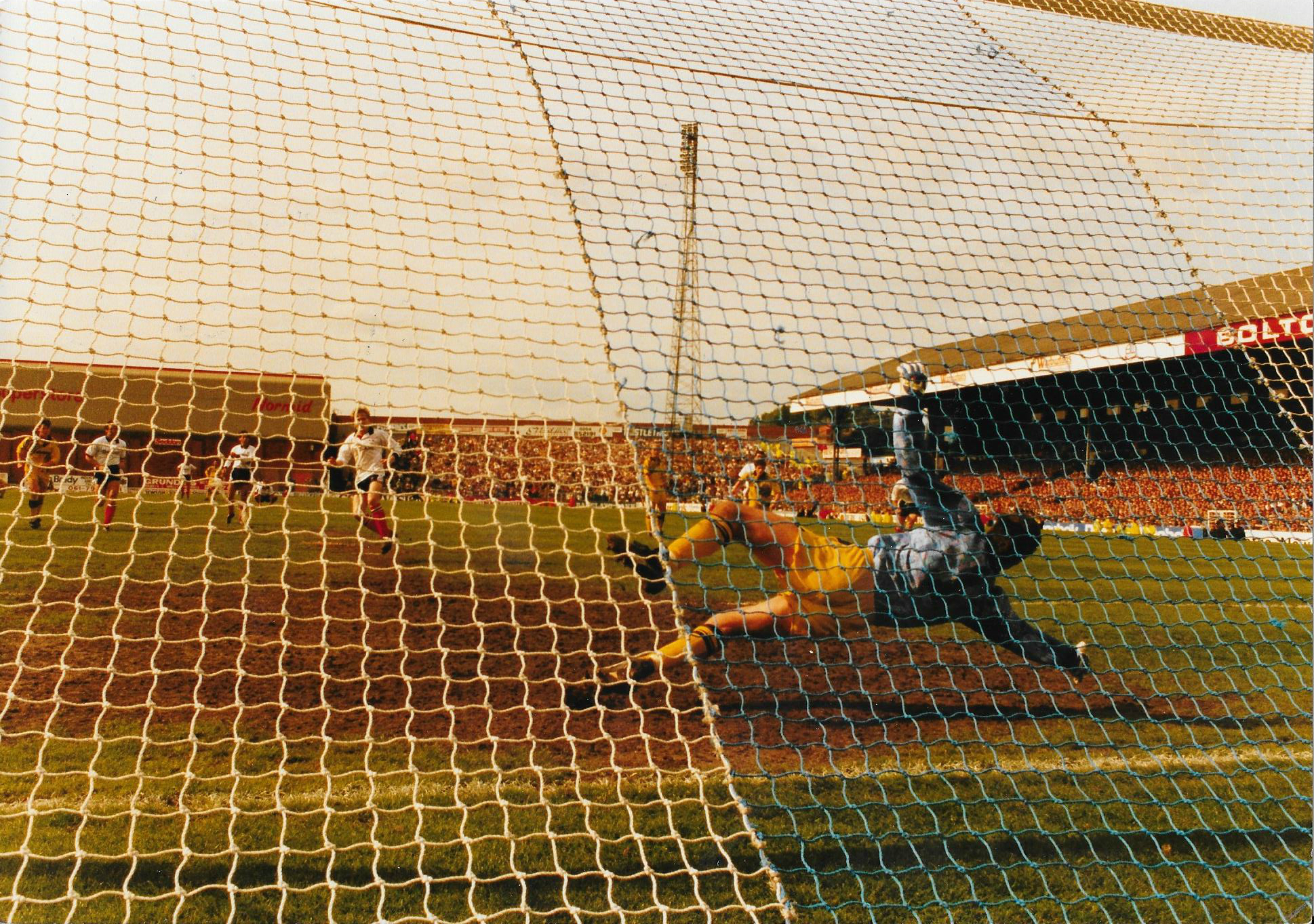 John McGinlay tucks away a penalty to seal a 1-0 win against Preston to send Wanderers up in 1993
