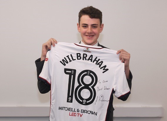 Ollie Aspden, with signed shirt. Picture: Harry McGuire 