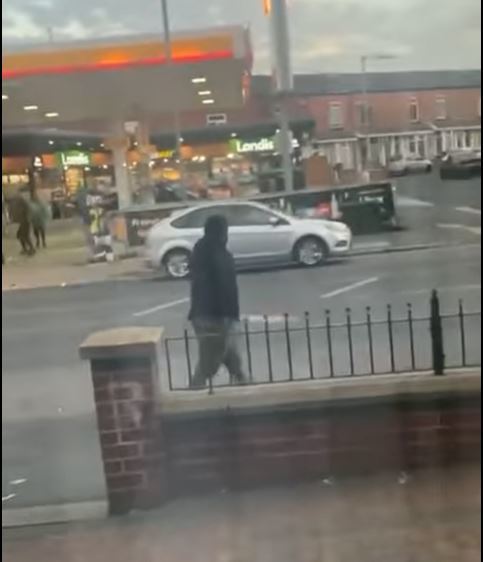 A video shared on social media showing a man carrying a machete during an assault in Chorley Old Road