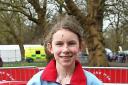 CHAMPAGNE CHARLOTTE: Charlotte Wilkinson with her prize after helping Lancashire win the English schools’ cross-country championship