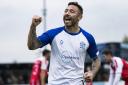 Tom Greaves celebrates his fourth goal in Bury AFC's 6-2 win over AFC Darwen Picture: Haydan Roberts