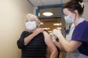 VACCINE: Ann Clubley receives her jab in Bolton