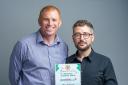 RECOGNITION: Chris Thair and Richard Dickson, of Prestwich's Play It Green, receive a  carbon hero Award