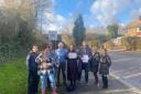 Bolton North East MP Mark Logan, Cllrs Stuart Haslam, Samantha Connor, and Amy Cowen, with residents from the Turton Road Crossing Group