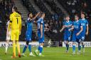 Dion Charles celebrates with Wanderers after his penalty against MK Dons