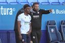 Bolton Wanderers manager Ian Evatt talks to Oladapo Afolayan as he comes on as a substitute in the 70th minute