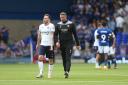 Ian Evatt and Gethin Jones walk off after Wanderers' draw at Ipswich in August