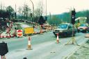 We think this photograph will stir memories for many readers. It was a case of no-go in Turton Road and slow-go in Bradshaw Brow during work by cabling company Nynex back in February, 1994. The company was laying miles of fibre optic cables beneath the