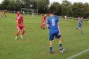 Daisy Hill's captain Jake O'Brien closes in on Radcliffe's Remi Thompson