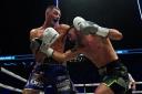 Jack Cullen, left, in action against Mark Heffron in their British super middleweight title bout