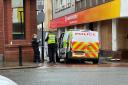 Police on Palatine Street in Bolton town centre on Monday afternoon