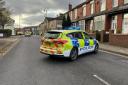 A police car near the incident on Tonge Moor Road in Bolton